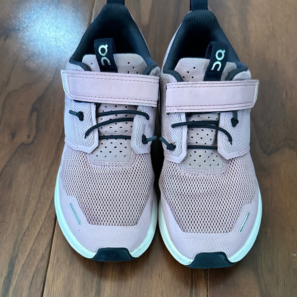 On Running Kids' Sneakers in Light Pink and Black.